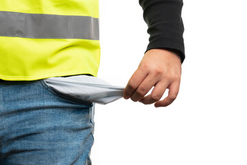 Close-up of poor builder man presenting empty pocket copyspace