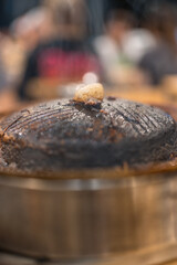 Dirty iron pan for barbeque burn skillet and without soup after eating Moo krata or Mu kratha