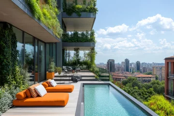 Fototapete Luxury infinity pool overlooking city skyline in a modern green building © Gatherina