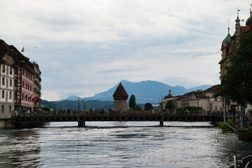 View of the Kapellbrücke bridge a bridge spanning the Reuss river in the city of Lucerne...