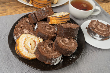 Chocolate Swiss Roll, Round Sponge Cake, Sliced Rolled Vanilla Biscuit with Cocoa Cream Filling