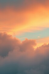 Fototapeta premium Sunset Cloudscape: A breathtaking panorama of clouds ablaze with the vibrant hues of a setting sun, showcasing a captivating interplay of orange, pink, and blue tones. 