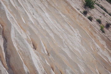 Fototapeta premium Chalk mining. Limestone quarry. Open-cast mining. Chalk hills. Chalk surface. Natural limestone.
