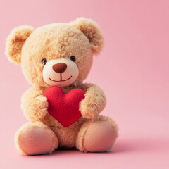 Obraz premium close-up cute toy teddy bear holding red heart on pink background with copy space