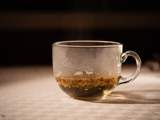 Cup of chamomile tea in glass mug