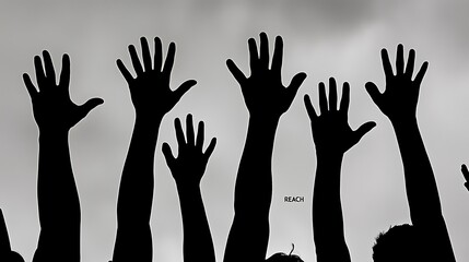 A group of people are holding up their hands in a row