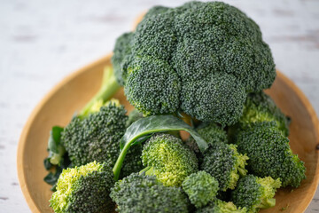 Fresh broccoli on the table.
