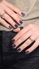 The beauty of the natural nails. Perfect clean manicure. New trendy nail arts on young women hand. gel polish