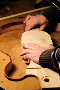 Crafting a Bass Guitar: Precision and Artistry in Progress