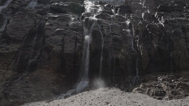 A majestic rocky waterfall on Mount Edith Cavell in the Canadian Rocky Mountains