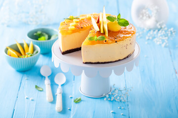 Sweet mango cheesecake made with mascarpone and fruits.