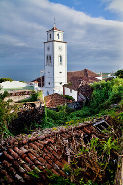 Scenic view of El Tanque with lush greenery and historic church