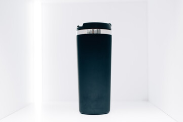 black thermos mug on white background