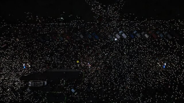 Aerial view of an enormous gathering of people protesting in the streets