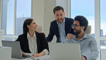 Corporate work multiracial coworkers woman man typing laptops in office happy businessman ceo...