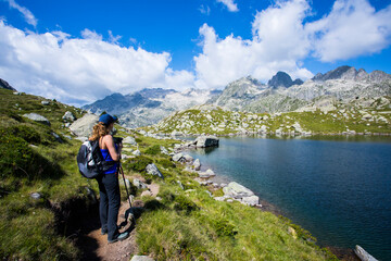 Young hiker woman in Vall de Boi, Aiguestortes and Sant Maurici National Park, Spain