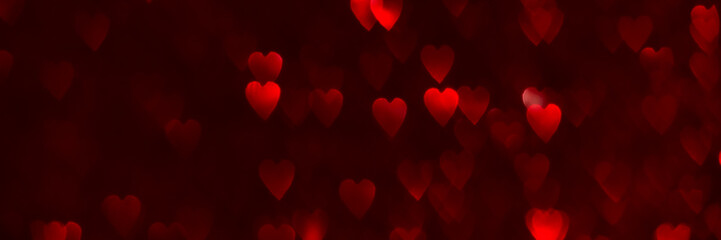 Red hearts, sparkling glitter bokeh background banner, valentines day abstract defocused texture header
