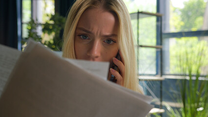 Annoyed angry stressed Caucasian business woman entrepreneur mad irritated shout at phone in office...