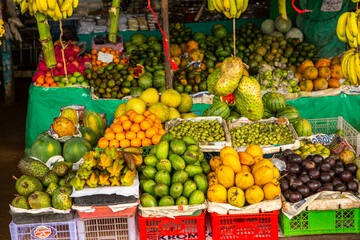 Fruits and vegetables at a local market in Sri lanka. Tropical or exotic fruits on the street in...