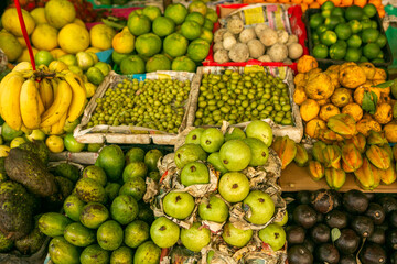 Fruits and vegetables at a local market in Sri lanka. Tropical or exotic fruits on the street in Asia.