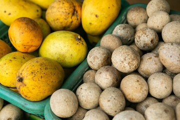 Fruits and vegetables at a local market in Sri lanka. Tropical or exotic fruits on the street in Asia.