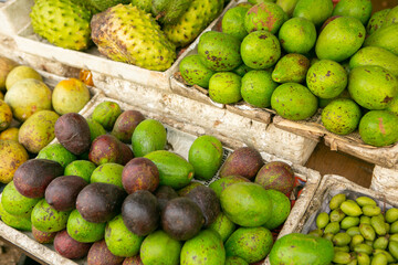 Fruits and vegetables at a local market in Sri lanka. Tropical or exotic fruits on the street in Asia.