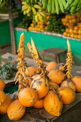 Fruits and vegetables at a local market in Sri lanka. Tropical or exotic fruits on the street in...