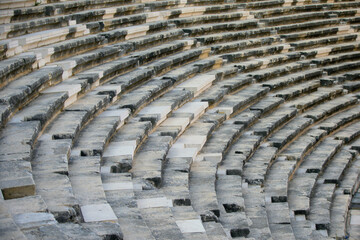 Part of an ancient amphitheater with a stone staircase.