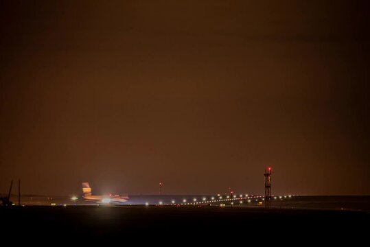 Nighttime Timelapse of Airplanes Landing and Taking Off at Leeds Bradford Airport