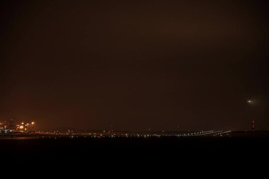 Nighttime Timelapse of Airplanes Landing and Taking Off at Leeds Bradford Airport