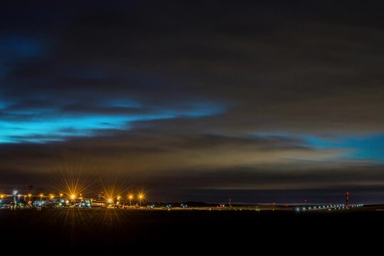Nighttime Timelapse of Airplanes Landing and Taking Off at Leeds Bradford Airport