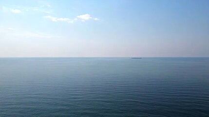 Obraz premium Baltic Sea aerial view showcasing vast expanse of water and distant coastline, symbolizing natural beauty and serene landscapes. 