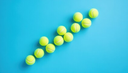 Tennis Balls on Blue Background: A Vibrant Sports Image