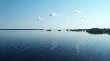 Baltic Sea aerial view showcasing vast expanse of water and distant coastline, symbolizing natural beauty and serene landscapes.
