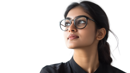 A thoughtful young woman with glasses gazes upwards, reflecting a deep sense of curiosity and concentration on her face.