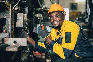 portrait professional engineer black african working service maintenance heavy industry machine