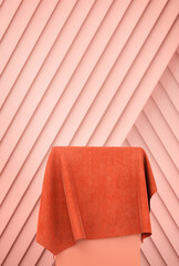 Abstract geometry cube podium with red velvet fabric for product presentation, light pink diagonal background; winners platform, 3d render, 3d illustration
