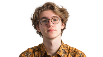 A young man with wavy hair and glasses, wearing a colorful shirt, poses confidently against a white background.