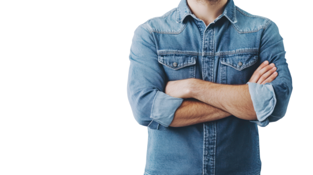 Casual man in a denim shirt standing confidently with arms crossed against a white isolate background. - Powered by Adobe