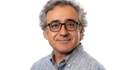 Portrait of a middle-aged man with grey hair and glasses, wearing a checkered shirt, smiling confidently on a white isolated background.