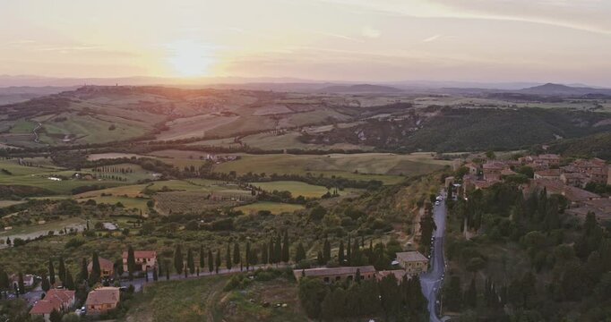 Aerial view of old town on a hill at sunset, Monticchiello, Val d'Orcia, Tuscany, Italy