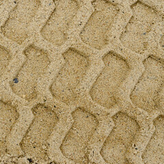 Tire tracks in the sand