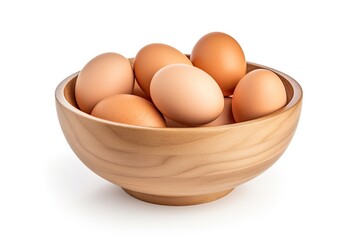 Isolated egg in wooden bowl with clipping path representing farm fresh eggs ready to cook