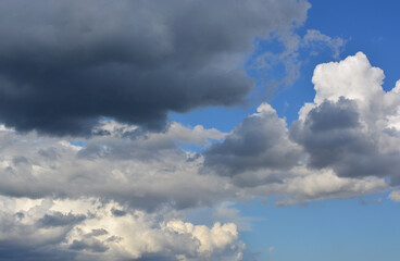 Dramatic Cloudscape blue sky dark clouds rainy clouds cumulous clouds  