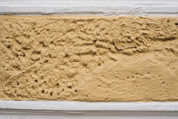 wall texture with porous decorative plaster