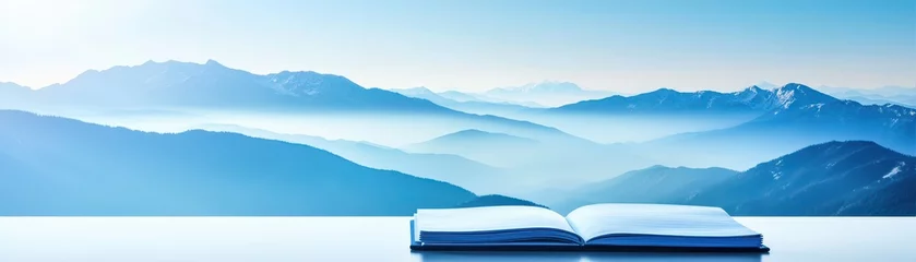Selbstklebende Fototapeten Exploring nature's beauty an open book with mountain views tranquil landscape daylight inspiring content © tanapat