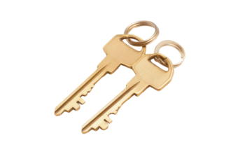 House key pair with metal house shaped keyring isolated on white background. PNG


