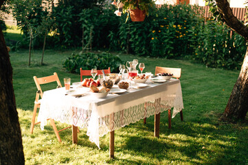 a set table in the garden in summer