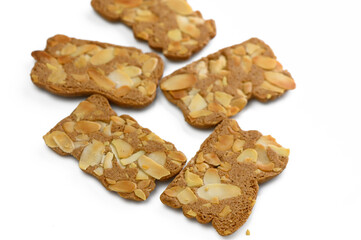 Crunchy almond treats arranged artistically on a clean surface inviting a sweet moment of joy