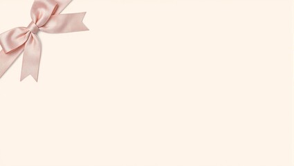 Delicate blush pink ribbon bow on beige backdrop